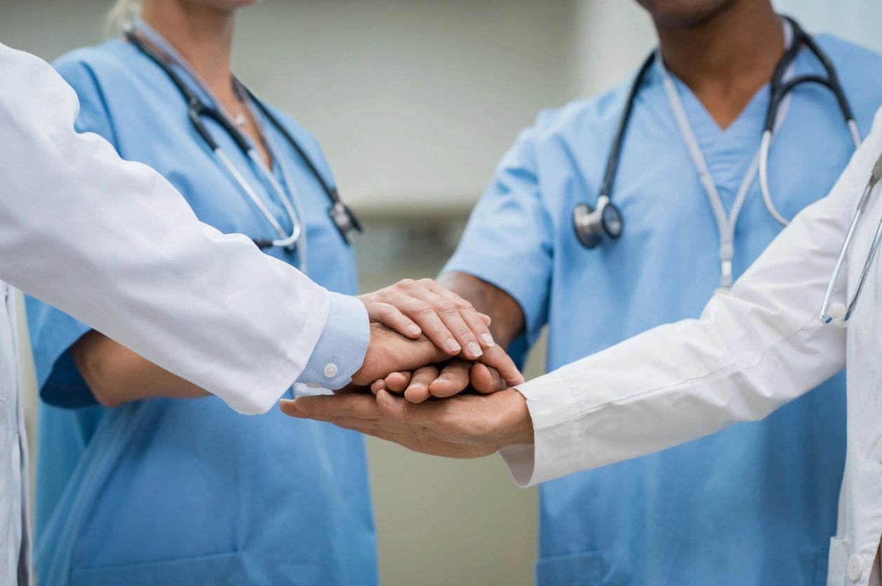 Dental care team working together to provide patient-focused care